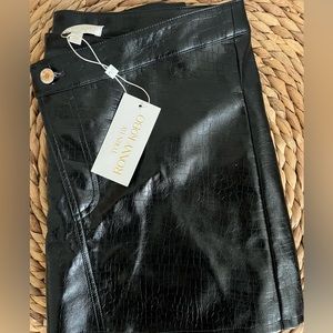 faux leather black skirt - crossover front button, liner inside